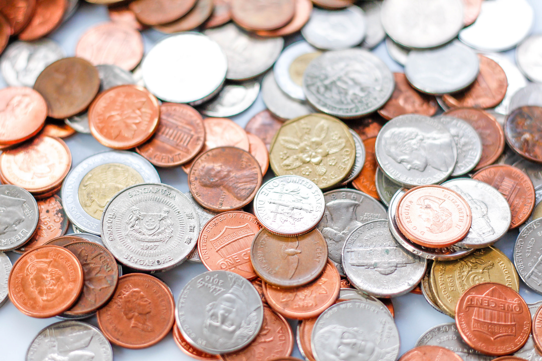 Photo of coins in several different currencies