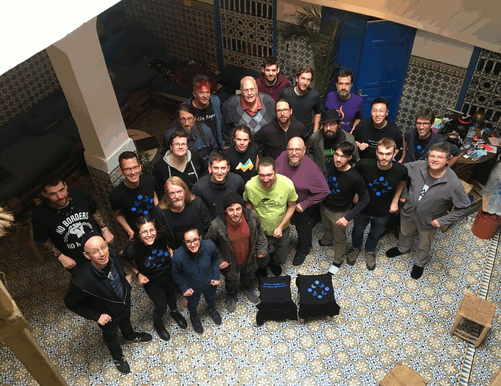 Participants at the 2019 Reproducible Builds Summit cheer